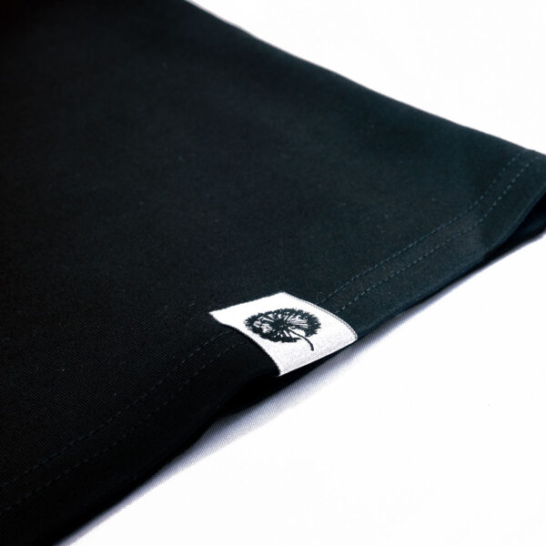 Abundance Inclusion Black Tee - Image 4